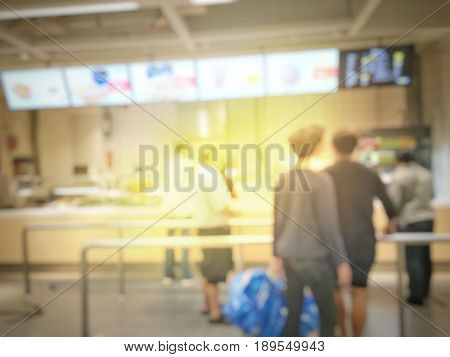 Blurred Image Of People Queue Up Waiting In Line To Buy Fast Food In Fastfood Store Or Seflservice R