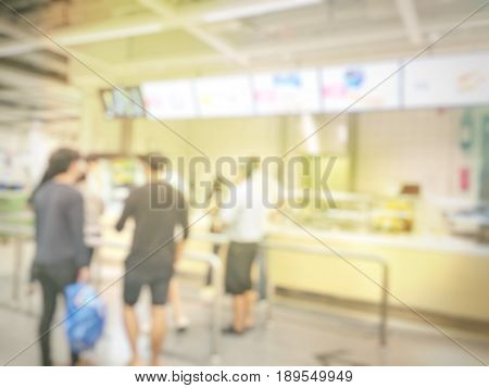 Blurred Image Of People Queue Up Waiting In Line To Buy Fast Food In Fastfood Store Or Seflservice R