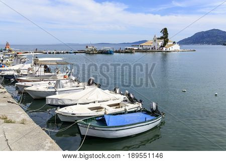 KANONI, GREECE - MAY 15: View of the old Greek Christian Orthodox church Vlacherna Monastery on May 15, 2017 in Kanoni, Corfu island in Greece.