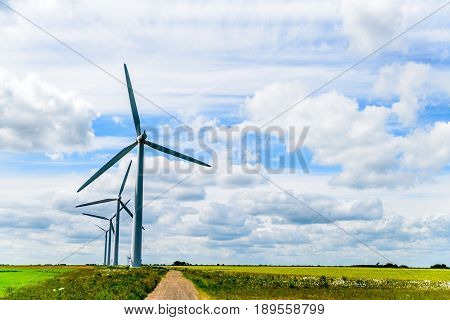 Day view wind power turbines generate electricity.