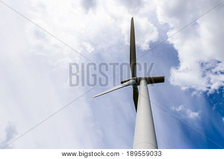 Day view wind power turbines generate electricity.