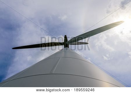 Day view wind power turbines generate electricity.