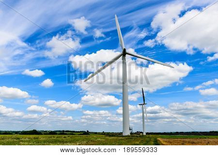 Day view wind power turbines generate electricity.