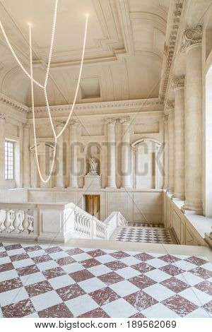 Paris, France, March 29 2017: Great hall and staircase of Versailles Chateau