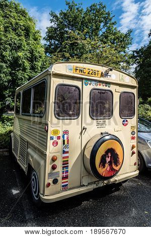 Oosterbeek Netherlands - August 09 2016: Old hippy van in public parking a sunny day of summer