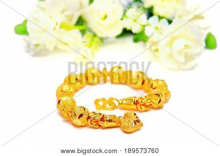 Gold Bracelet 96.5 Percent Thai Gold Grade With Flowers And Unique Gold Heart Pendant Isolated On Wh