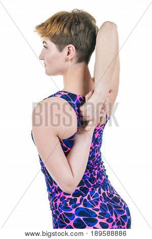 Healthy lifestyle sport. Young girl kneads hands and shoulders on a white background