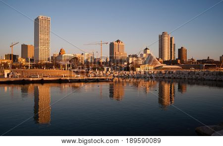 MILWAUKEE WISCONSIN/UNITED STATES - APRIL 1: Most of the cities residents sleep as the sun comes up on the downtown waterfront on 04/01/2017 in Milwaukee WI.