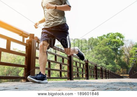 Running Man. Male Runner At Sprinting Speed Training For Marathon Outdoors