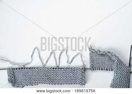 Knitted sweaters with knitting needles and wool, hendmade