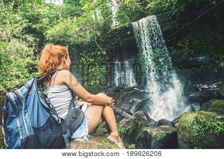 woman asia travelers travel. Walking hand travelers travel nature Forests mountains waterfalls. puhinrongkla romklao-paradorn waterfall
