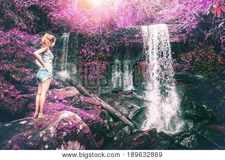woman asia travelers travel. Walking hand travelers travel nature Forests mountains waterfalls. puhinrongkla romklao-paradorn waterfall