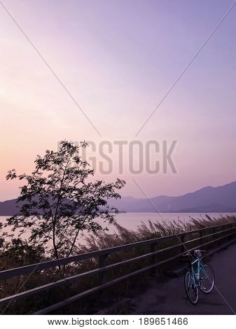 Mint Green Retro Bicycle, Road Frame, Mountain, Lake And Gradient Sky