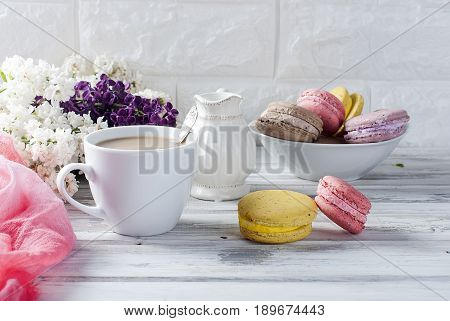 Coffee And Macaruns On A White Background