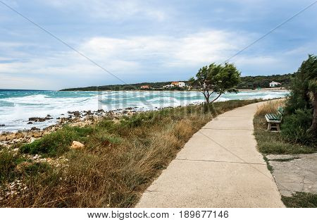 Strong Wind, Sea Waves And The Coast Or Beach.