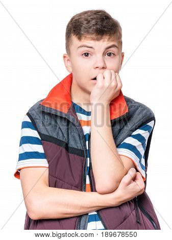 Half-length emotional portrait of caucasian teen boy. Surprised or scared teenager looking at camera. Handsome child, isolated on white background.