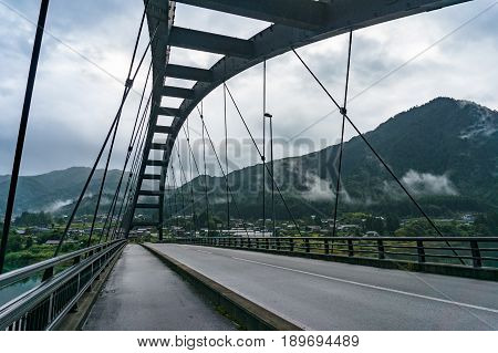 Bridge Structure With View Of Countryside And Mountains
