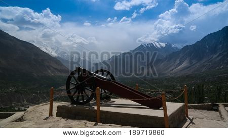 Gun near Baltit fort, view to Karimabad and Hunza valley, Pakistan