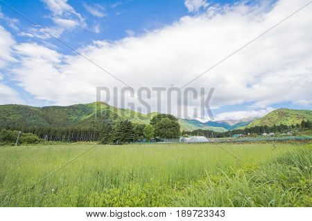 Beautiful landscape of Takayama mura at sunny summer or spring day and blue sky in Kamitakai District in northeast Nagano Prefecture Japan.