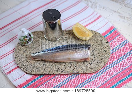 Brainless Crude Mackerel And A Tail On A Light Background