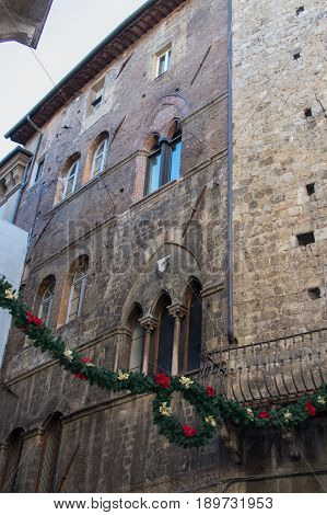 Italy Siena - December 26 2016: the view of christmas decorations on the streets of Siena on December 26 2016 in Siena Tuscany Italy.