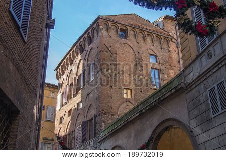 Italy Siena - December 26 2016: the view of the typical building of Siena on December 26 2016 in Siena Tuscany Italy.