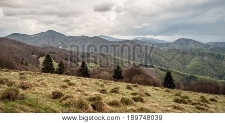 mountain panorama with only wild nature with hills and mountain meadows from Nolcovska Magura hill in Velka Fatra mountains in Slovakia