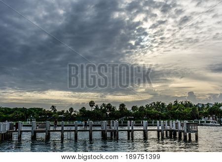 fishing pier on a cloudy morning at the inlet