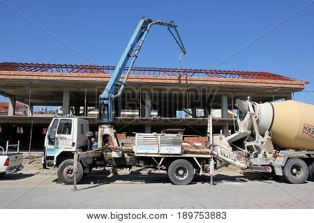 31ST MAY 2017,FETHIYE,TURKEY: Concrete being pumped by workers on a new build in fethiye, turkey, 31st may 2017