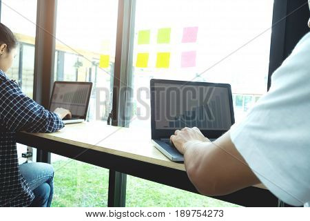 Young Startups Businessmen Teamwork Brainstroming Meeting To Discuss Plan Startup Project.