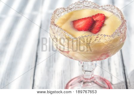 Sabayon With Strawberry Slices On The Wooden Background