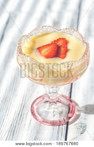 Sabayon With Strawberry Slices On The Wooden Background