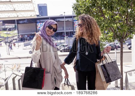 Two Beautiful Girls With Shopping Bags