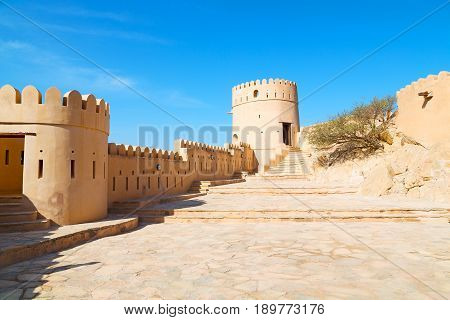 In Oman    Muscat    The   Old Defensive  Fort Battlesment Sky And  Star Brick