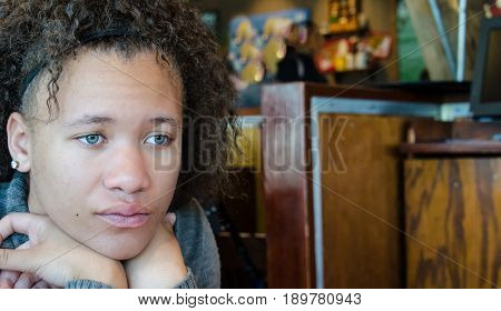 Teenage girl in deep thought on her time