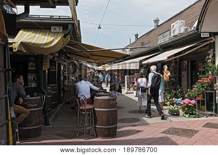 VIENNA, AUSTRIA-JUNE 01, 2017: People enjoy the Naschmarkt in Vienna, Austria