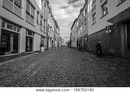 SCHWEINFURT GERMANY - APRIL 21 2017: Old streets in the historic part of the city. Black and white. Schweinfurt - a medieval city founded in 761 year.