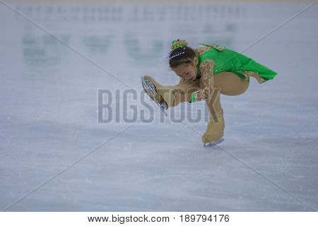 Minsk Belarus -April 23 2017: Unidentified Female Figure Skater performs Chicks Ladies Free Skating Program at Minsk Arena Cup 2017 International Figure Skating Competition in April 23 2017 in Minsk Belarus