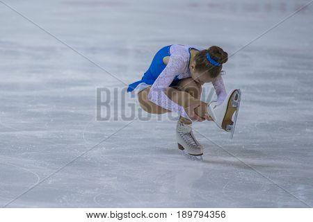 Minsk Belarus -April 23 2017: Unidentified Female Figure Skater performs Chicks Ladies Free Skating Program at Minsk Arena Cup 2017 International Figure Skating Competition in April 23 2017 in Minsk Belarus