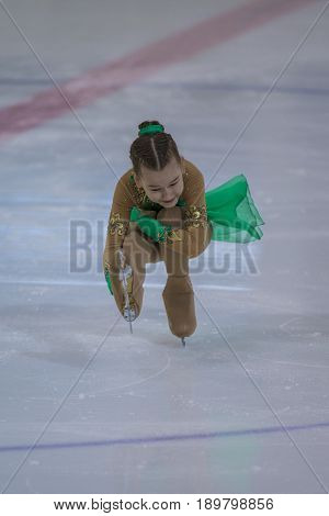 Minsk Belarus -April 23 2017: Unidentified Female Figure Skater performs Chicks Ladies Free Skating Program at Minsk Arena Cup 2017 International Figure Skating Competition in April 23 2017 in Minsk Belarus