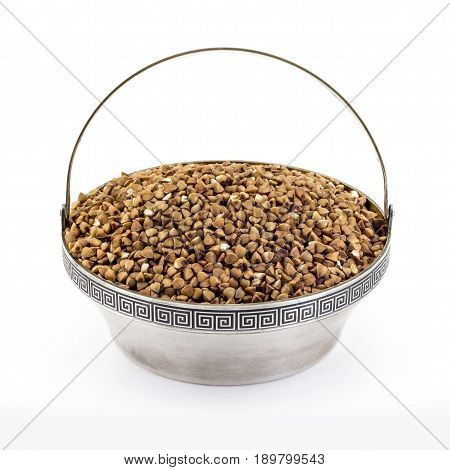 Buckwheat Groats In Antique Silver Pial On A White Background