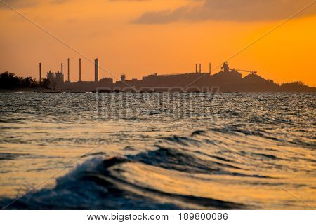 The silhouette of Gove Operations Bauxite Mine Alumina Refinery in Gove peninsula in the northern territory, Australia.