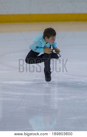 Minsk Belarus -April 23 2017: Unidentified Male Figure Skater Performs Bronze Class Men Free Skating Program at Minsk Arena Cup 2017 International Figure Skating Competition in April 23 2017 in Minsk Belarus