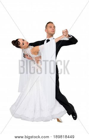 dance ballroom couple in a dance pose isolated on white background. sensual professional dancers dancing walz tango slowfox and quickstep.
