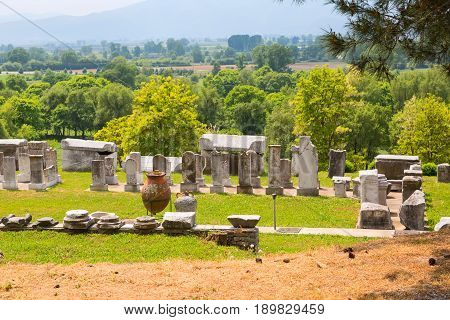 Philippi, Greece - April 30, 2016: Ancient ruins remains, stones, pottery in province of Lydia, Philippi, Greece
