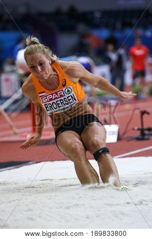 BELGRADE SERBIA - MARCH 3-5 2017: WOMAN LONG JUMP PENTATHLON BROERSEN NADINE EUROPEAN ATHLETICS INDOOR CHAMPIONSHIPS IN BELGRADE SERBIA