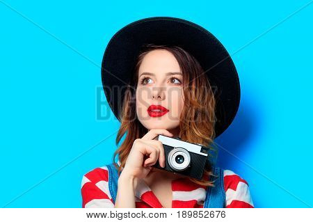Woman Wit Camera On Blue Background