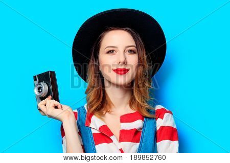 Woman Wit Camera On Blue Background