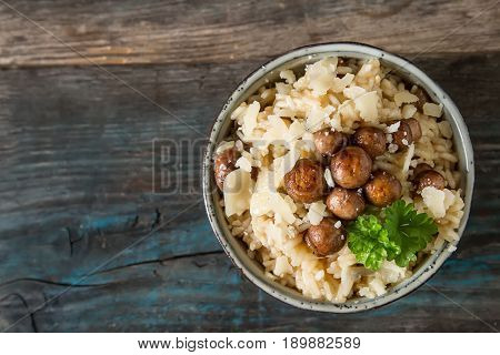 Mushroom Risotto With Parmesan Cheese. Italian Food. Simple Back