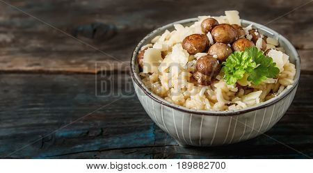 Mushroom Risotto With Parmesan Cheese. Italian Food. Simple Back